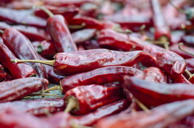 Full frame shot of red chili peppers in market