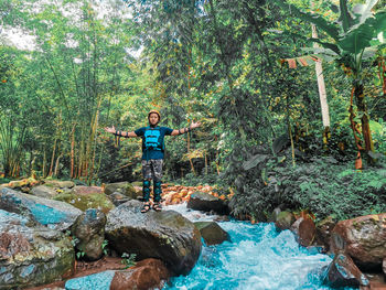 Portrait of man in outbound clothes on the river