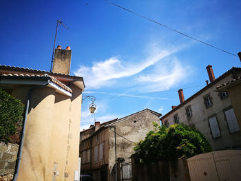 Low angle view of buildings against sky