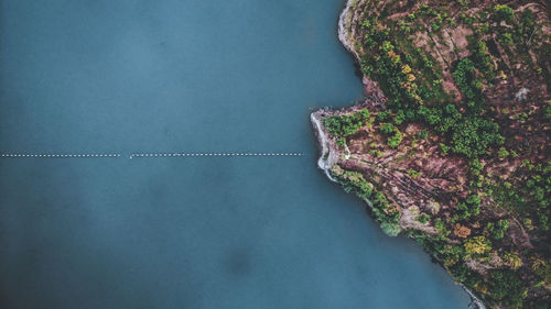 Scenic view of sea against blue sky