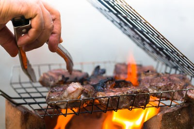 Close-up of meat on barbecue grill