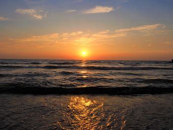 Scenic view of sea against sky during sunset