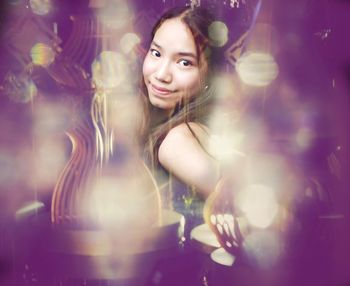 Portrait of a smiling young woman