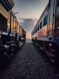 Train on railroad track against sky