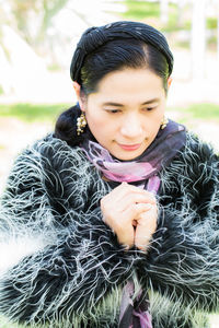 Portrait of a young woman with eyes closed