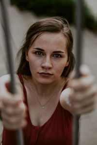 Portrait of beautiful woman standing outdoors