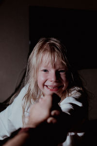 Portrait of smiling girl at home