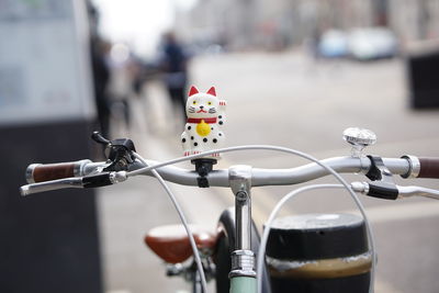 Close-up of bicycle in basket on street