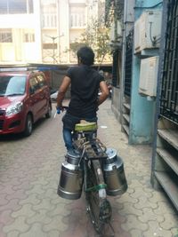 Rear view of man on motorcycle