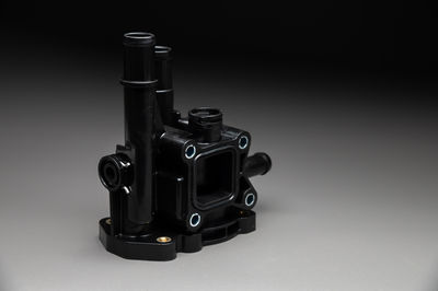 Close-up of camera on white background