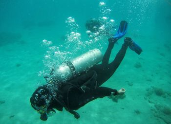 Man swimming in sea