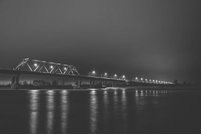 Illuminated ferris wheel at night