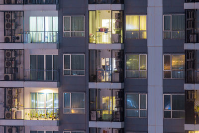 Full frame shot of modern building at night