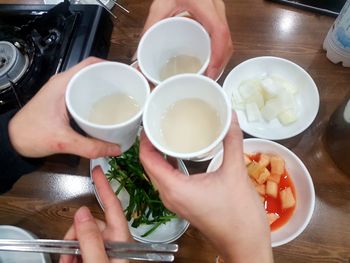 High angle view of people preparing food