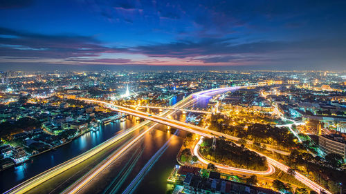 High angle view of illuminated city at night