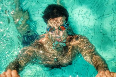 Woman swimming in pool