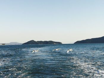 Scenic view of sea against clear sky