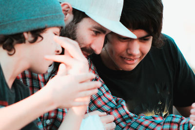 Family looking down outdoors