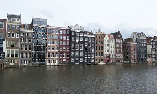 Buildings in city against sky