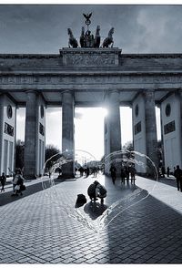 Tourists in front of historic building