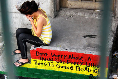 Close-up of woman standing in pond