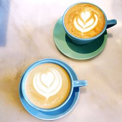 High angle view of cappuccino on table