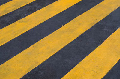 Full frame shot of yellow zebra crossing