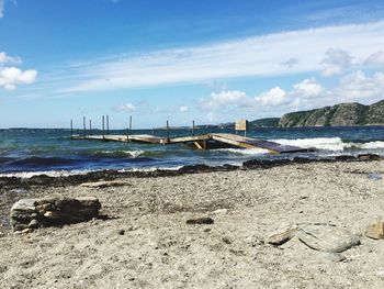 Scenic view of beach against sky