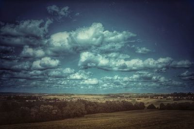 Scenic view of field against sky