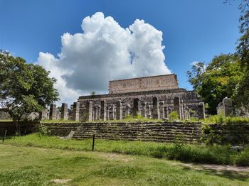 Old ruin building against cloudy sky