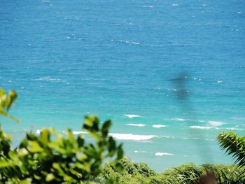 Close-up of sea against blue sky