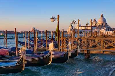 Boats moored in sea