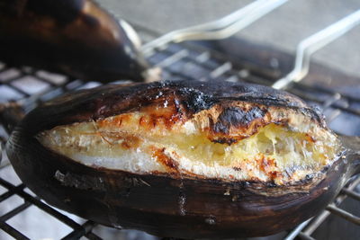 Close-up of meat in cooking pan