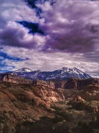 Scenic view of snowcapped mountains against sky