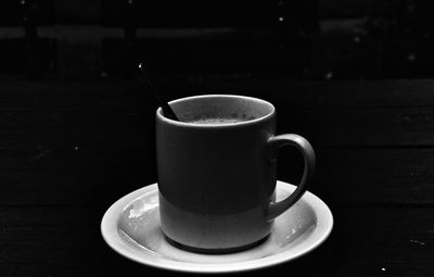 Close-up of coffee cup on table