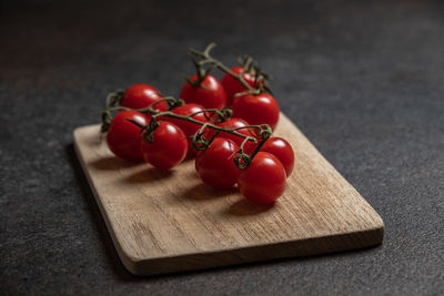 Close-up of cherry tomatoes on cutting board