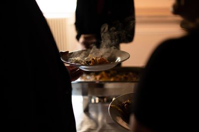 High angle view of people on table