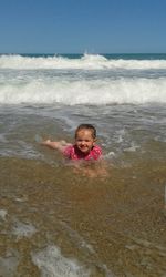 Portrait of smiling girl on beach