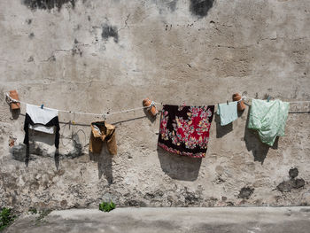 Women standing against wall