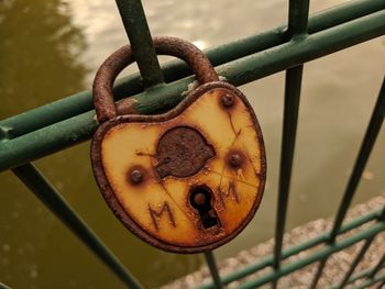 Close-up of padlocks on fence