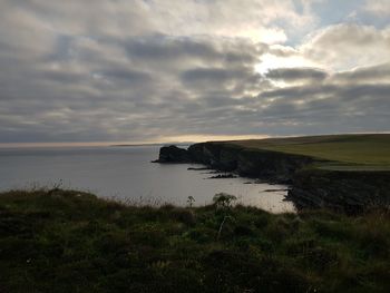 Scenic view of sea against sky during sunset