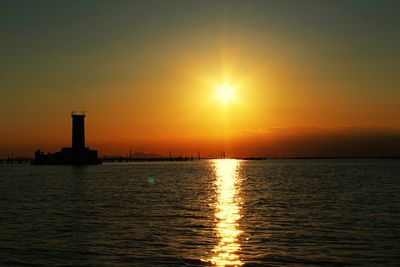 Scenic view of sea at sunset