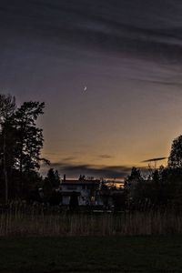 Scenic view of landscape against sky at sunset