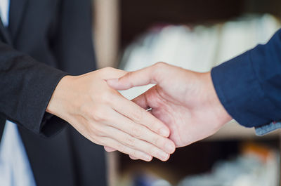 Close-up of business people shaking hands