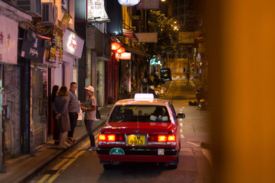 Traffic on street in city at night