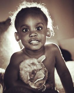 Backlit portrait of cute baby