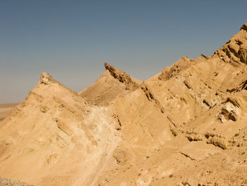 Low angle view of desert against sky