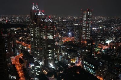 Illuminated cityscape at night