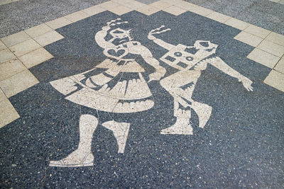 Impressive historical inlaid stone artwork of the walking street in the old town of puno, peru