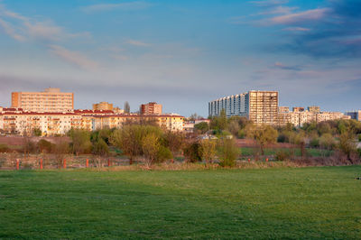 Buildings in city against sky